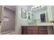 Bright bathroom showcases a beautifully tiled shower, modern sink, and vanity area at 507 Augusta Se Dr, Marietta, GA 30067