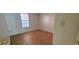Spacious bedroom features a window and tan carpet at 507 Augusta Se Dr, Marietta, GA 30067