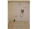 Empty laundry room ready for washer and dryer installation with tile floor at 507 Augusta Se Dr, Marietta, GA 30067