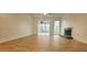 Spacious living room with wood floors, a fireplace, ceiling fan, and lots of natural light at 507 Augusta Se Dr, Marietta, GA 30067