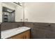 A modern bathroom vanity with white marble countertop, sleek fixtures, and stylish tilework for a sophisticated look at 273 12Th Ne St # 210, Atlanta, GA 30309