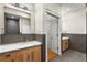 Modern bathroom vanity with marble countertop, wood cabinets, sleek mirror, and upscale fixtures at 273 12Th Ne St # 210, Atlanta, GA 30309