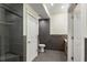 Modern bathroom featuring sleek gray tile, glass shower, and contemporary fixtures at 273 12Th Ne St # 210, Atlanta, GA 30309