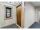 Building hallway featuring carpeted floors and an framed picture at 273 12Th Ne St # 210, Atlanta, GA 30309