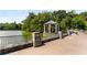 Picturesque gazebo on the water's edge, offering serene views and a tranquil setting for relaxation at 273 12Th Ne St # 210, Atlanta, GA 30309