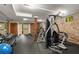 Well-equipped gym features modern exercise machines and weights for a comprehensive fitness experience in the building at 273 12Th Ne St # 210, Atlanta, GA 30309