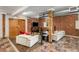 Cozy living room featuring exposed brick wall, comfortable couches, and vintage-style decor at 273 12Th Ne St # 210, Atlanta, GA 30309