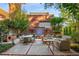Beautiful outdoor patio with brick flooring, outdoor seating, grill, and charming water fountain at 273 12Th Ne St # 210, Atlanta, GA 30309