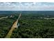Aerial view of property showing pond and wooded area at 4955 H D Atha Rd, Covington, GA 30014