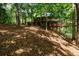 House nestled in a wooded area, elevated position at 4955 H D Atha Rd, Covington, GA 30014