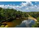 Aerial view of property with pond and house at 4955 H D Atha Rd, Covington, GA 30014