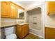 Clean bathroom with wood cabinets and a shower/tub combo at 4955 H D Atha Rd, Covington, GA 30014