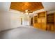 Main bedroom with wood ceiling and built-in shelving at 4955 H D Atha Rd, Covington, GA 30014