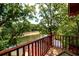 Deck with lake views, offering peaceful relaxation at 4955 H D Atha Rd, Covington, GA 30014