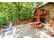 Enjoy outdoor living on the expansive deck with picturesque views and ample seating at 4955 H D Atha Rd, Covington, GA 30014