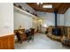 Charming home office with wood-burning stove, built-in shelves, and wood walls at 4955 H D Atha Rd, Covington, GA 30014