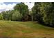 Two-story home nestled amongst the trees at 4955 H D Atha Rd, Covington, GA 30014