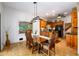 Kitchen features wood cabinets, granite countertops, and black appliances at 4955 H D Atha Rd, Covington, GA 30014