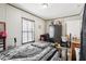 Bedroom with zebra print bedding and ample closet space at 127 Cambridge Ct, Hampton, GA 30228