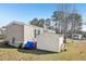 Mobile home with a storage shed in the backyard at 127 Cambridge Ct, Hampton, GA 30228