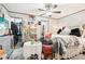 Spacious main bedroom with a walk-in closet and ceiling fan at 127 Cambridge Ct, Hampton, GA 30228