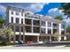Modern building exterior offers balconies and upscale features for condo residences close to downtown at 318 Sandy Springs Cir # 250, Sandy Springs, GA 30328