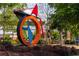 Modern outdoor sculpture in a park setting with walking path, trees, and landscaping at 318 Sandy Springs Cir # 250, Sandy Springs, GA 30328