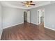 Bright bedroom with hardwood floors and access to bathroom at 46 Norman Rd, Covington, GA 30014