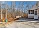 Spacious backyard with patio, shed, and wooded area at 5120 Due West Nw Rd, Kennesaw, GA 30152