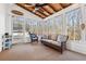 Relaxing screened porch with wicker furniture, offering wooded views at 5120 Due West Nw Rd, Kennesaw, GA 30152