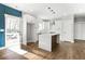 Modern kitchen featuring white cabinets and an island at 629 Elmwood St, Canton, GA 30114