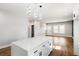 Modern kitchen with white cabinets and a center island at 629 Elmwood St, Canton, GA 30114