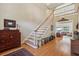 Grand foyer with hardwood floors and staircase leading to a second story overlooking the entry at 11050 Wilshire Chase Dr, Johns Creek, GA 30097