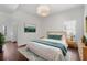 Spacious bedroom with hardwood floors and access to the bathroom at 1230 Piedmont Ne Ave # 405, Atlanta, GA 30309