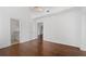 Well-lit bedroom with hardwood floors and an ensuite bathroom at 1230 Piedmont Ne Ave # 405, Atlanta, GA 30309