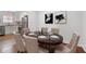 Elegant dining room featuring hardwood floors and a spacious table at 1230 Piedmont Ne Ave # 405, Atlanta, GA 30309