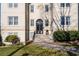 Building entrance with stairs and landscaping at 1230 Piedmont Ne Ave # 405, Atlanta, GA 30309