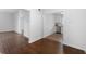 Open living room with hardwood floors and kitchen access at 1230 Piedmont Ne Ave # 405, Atlanta, GA 30309
