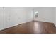 Bright living room with hardwood floors and neutral walls at 1230 Piedmont Ne Ave # 405, Atlanta, GA 30309