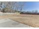 Large backyard with fenced-in area and patio at 2463 Candlewood Way, Lawrenceville, GA 30044