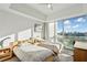 Well lit bedroom with two twin beds and city views at 1100 Howell Mill Nw Rd # 610, Atlanta, GA 30318
