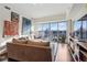 Spacious living room with city views and hardwood floors at 1100 Howell Mill Nw Rd # 610, Atlanta, GA 30318