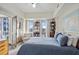 Bright main bedroom with city views and a large bed at 1100 Howell Mill Nw Rd # 610, Atlanta, GA 30318