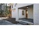 Side porch with a patterned tile floor and ceiling fan at 2301 N Decatur Rd, Decatur, GA 30033