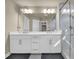 Double vanity bathroom with a large shower at 3179 Clairebrooke Ave, Atlanta, GA 30341