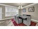 Bright dining room with hardwood floors and a large dining table at 3179 Clairebrooke Ave, Atlanta, GA 30341