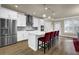 Modern kitchen featuring white cabinets, stainless steel appliances, and an island at 3179 Clairebrooke Ave, Atlanta, GA 30341