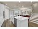 Modern kitchen with white cabinets, quartz countertops, and stainless steel appliances at 3179 Clairebrooke Ave, Atlanta, GA 30341
