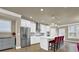 Modern kitchen with white cabinets, quartz countertops, and stainless steel appliances at 3179 Clairebrooke Ave, Atlanta, GA 30341