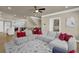 Spacious living room featuring a large sectional sofa and hardwood floors at 3179 Clairebrooke Ave, Atlanta, GA 30341